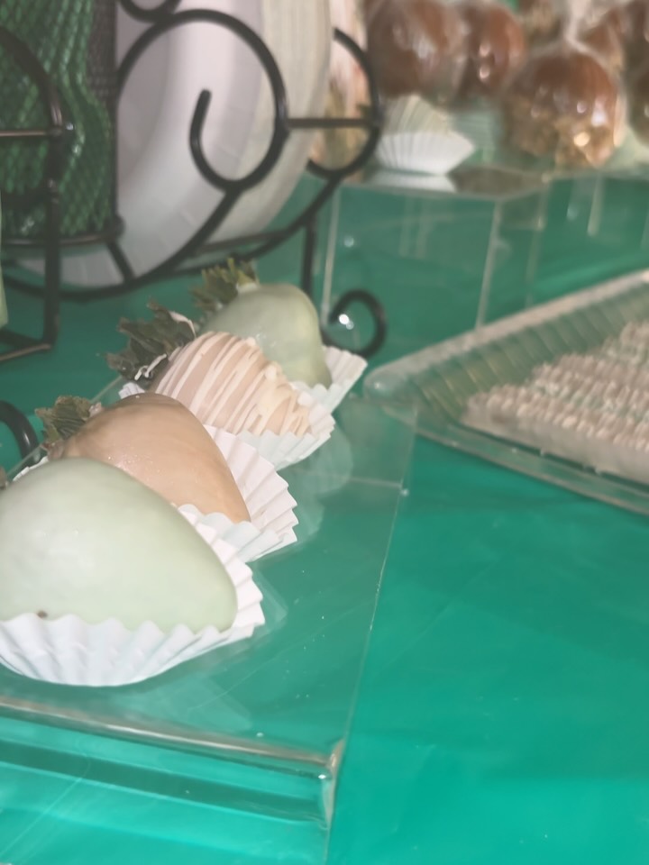 Sage and blush treats on a dessert table