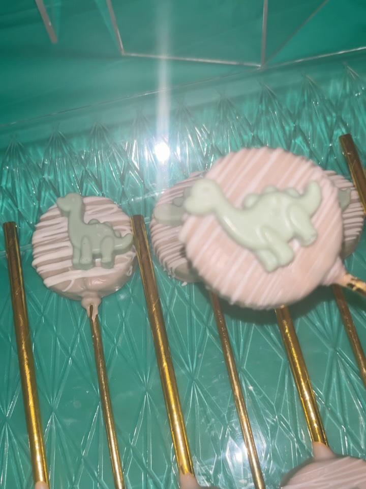 Dinosaur Oreo pops on gold sticks